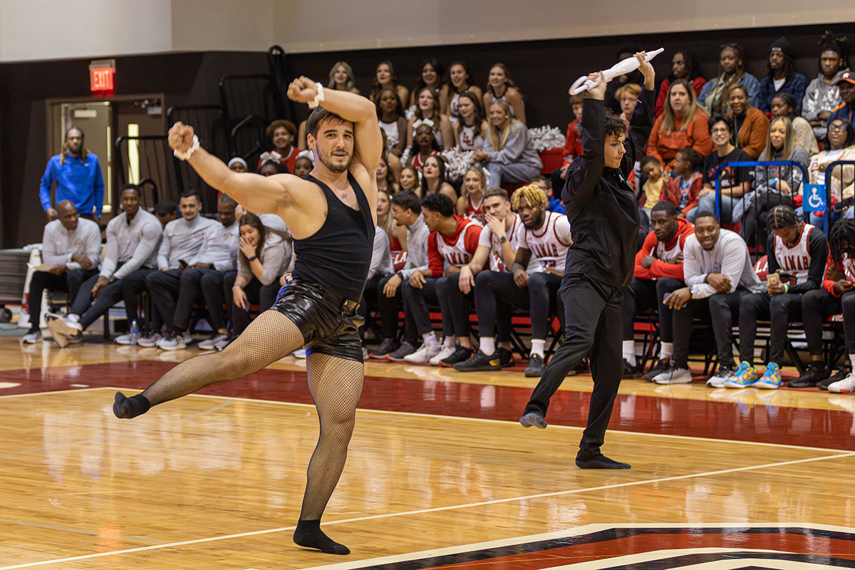 Members of the Alpha Tau Omega fraternity perform to Rihanna's "Umbrella" as part of the Greek life talent battle during McDonald Mayhem, Oct. 30, in McDonald Gym. UP photo by Brian Quijada.