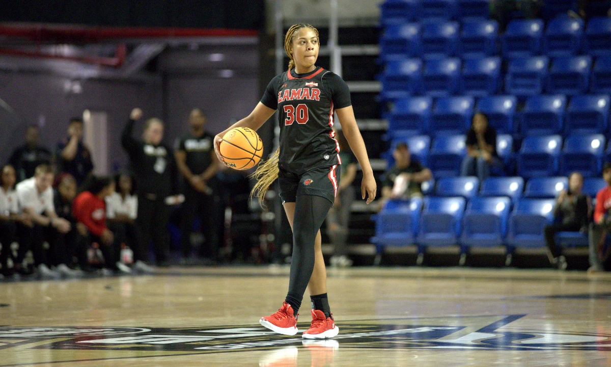 R'Mani Taylor dribbles upcourt during Lamar's game against the Islanders, March 8 at the Legacy Center in Lake Charles, Louisiana.