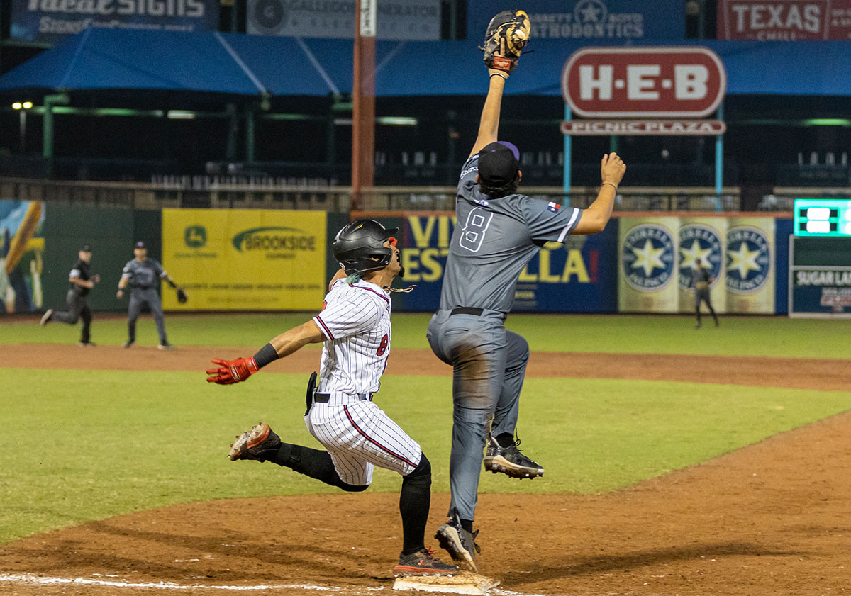 LU senior Kevin Bermudez makes it to first base on time after getting a hit against Stephen F. Austin State University in the Sugarland Classic on Feb. 25, at the Constellation Field in Sugarland, TX. UP photo by Brian Quijada.