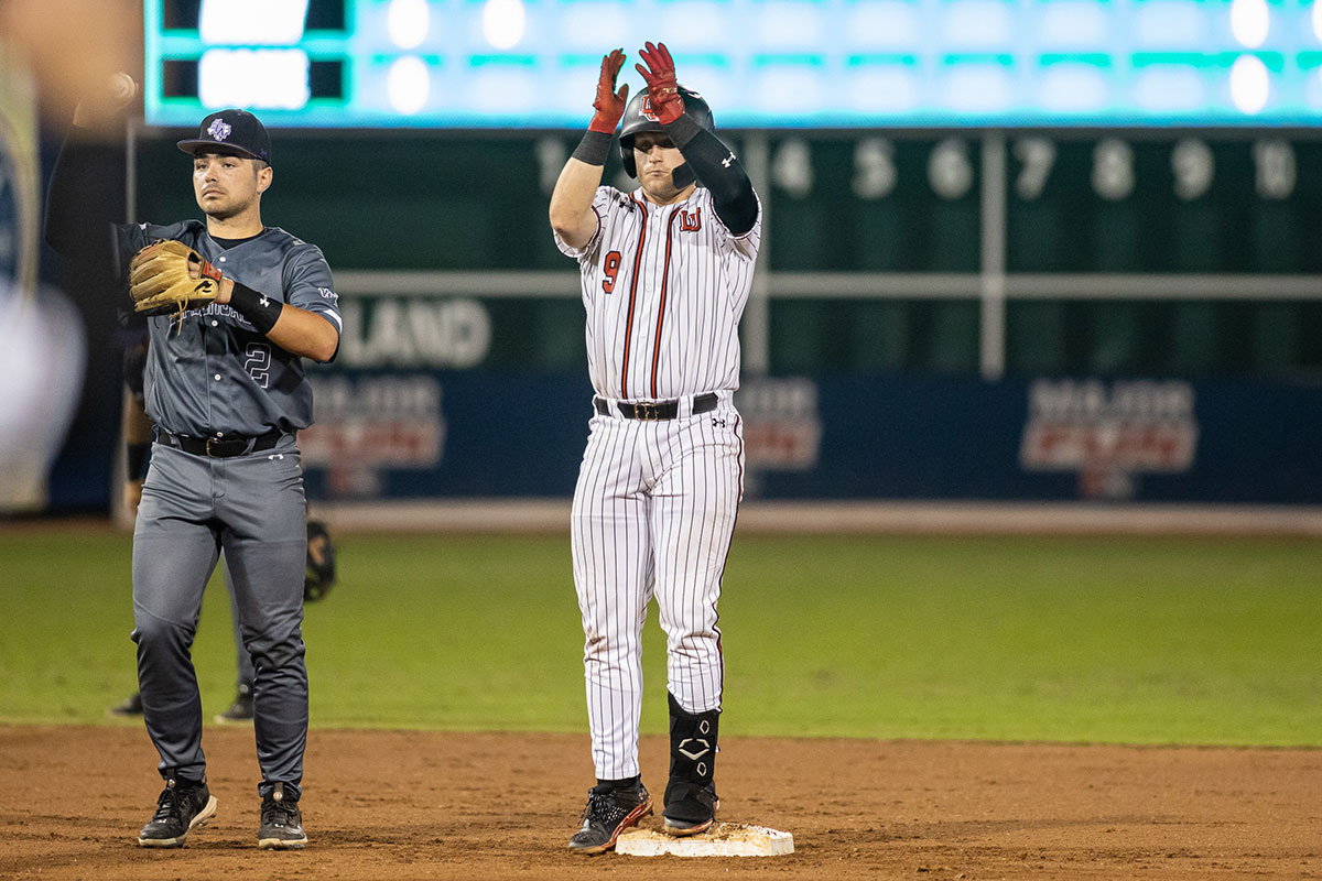 Cardinal catcher Ryan Snell celebrates after getting a two-base hit against Stephen F. Austin State University in the Sugarland Classic on Feb. 25, at the Constellation Field in Sugarland, TX. UP photo by Brian Quijada.