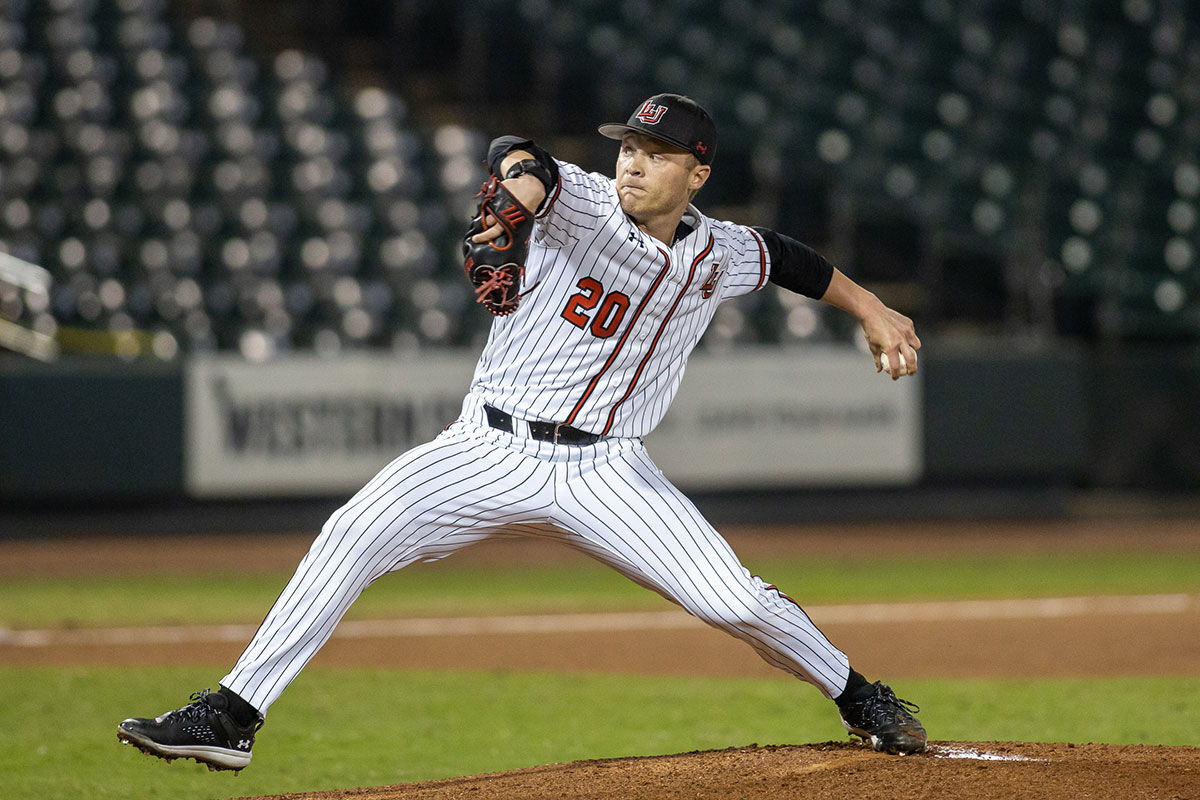 LU junior, Jacob Ellis pitches against Stephen F. Austin State University at the Sugarland Classic on Feb. 25, in the Constellation Field in Sugarland, TX. UP photo by Brian Quijada.