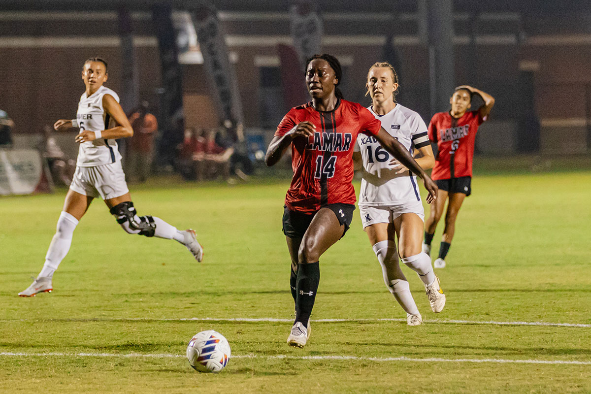 Cardinal forward Cariel Ellis runs up the field to shoot the ball against Xavier University, Sept. 14, at Lamar University Soccer Complex. UP photo by Allyson Arnold.