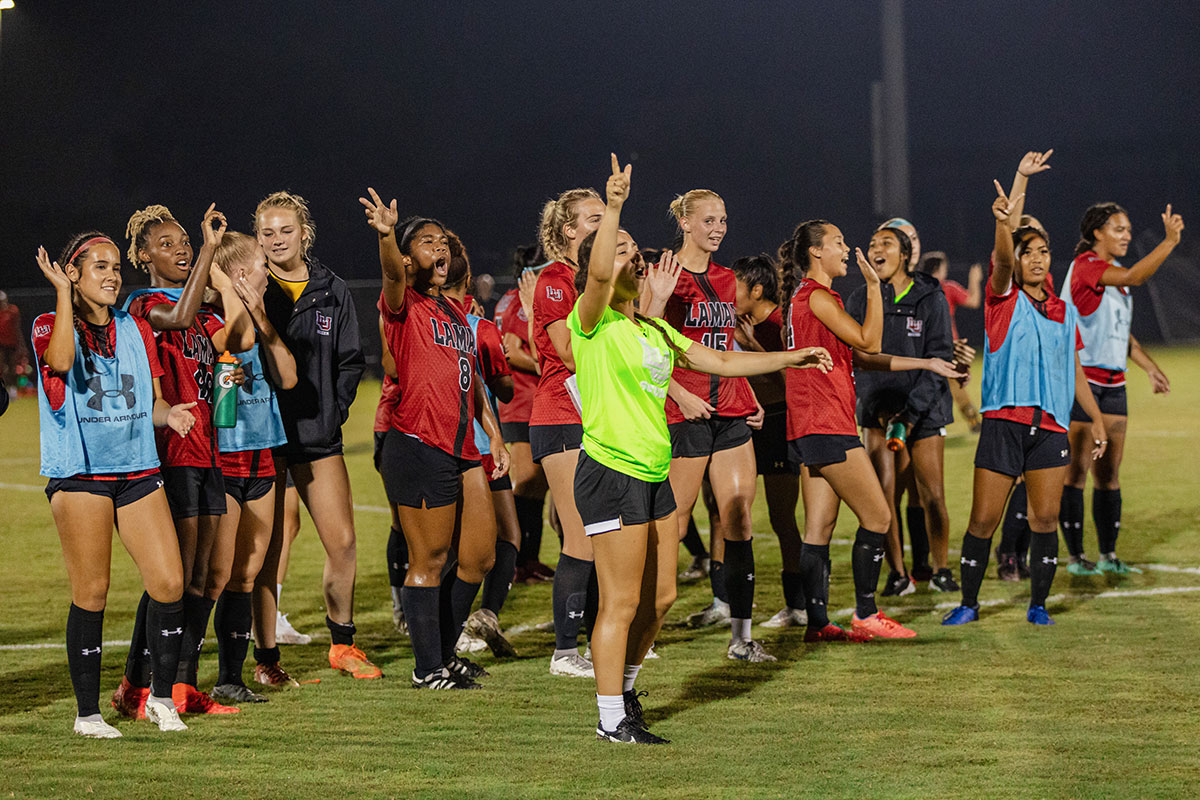 LU soccer sings the school song after winning the match against Xavier University, Sept. 14, at Lamar University Soccer Complex. UP photo by Allyson Arnold.