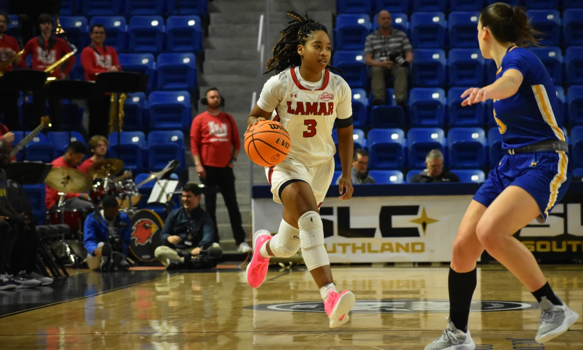 Sabria Dean takes the ball up during a game against McNeese State, March 8 at the Legacy Center in Lake Charles, Louisiana.