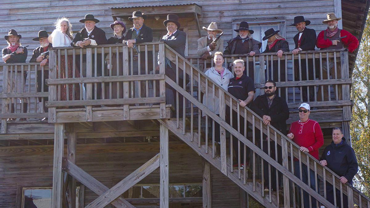 The Spindletop Gladys-City Boomtown faculty and staff pose for a picture during the 123rd Spindletop Anniversary at the Spindletop Gladys-City Boomtown Museum, Jan. 13. UP photo by Carlos Viloria.