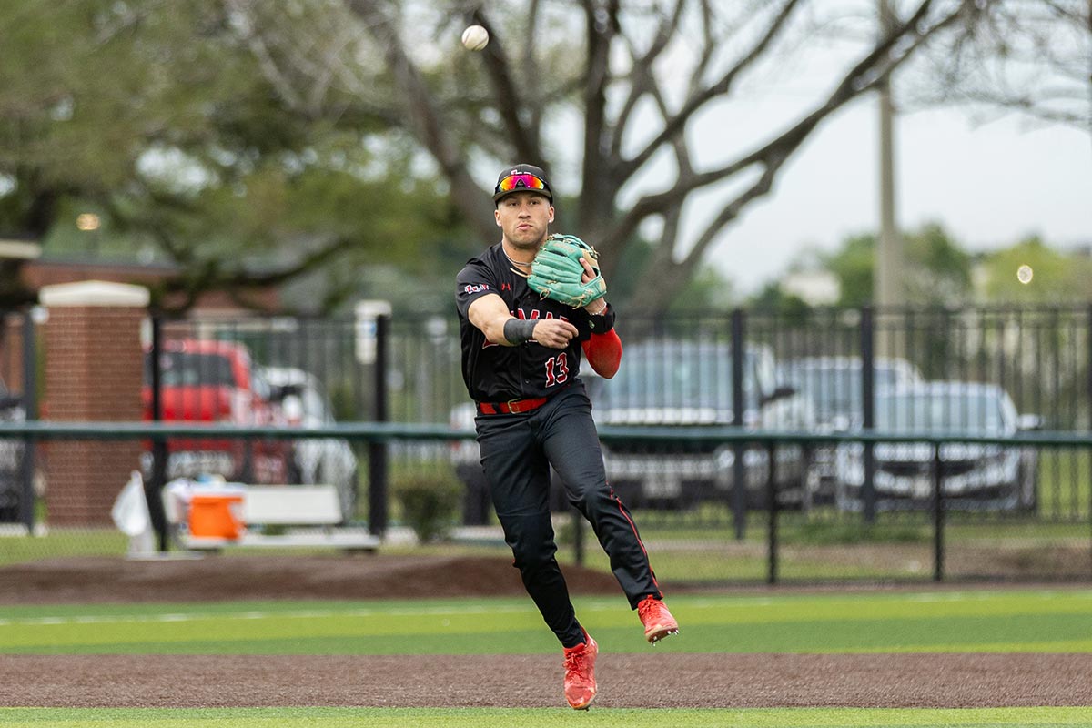 LU infielder Ethan Ruiz throws the ball to first base to get a runner out against Prairie View A&M University, at the Vincent-Beck Stadium, March 19. UP photo by Brian Quijada.