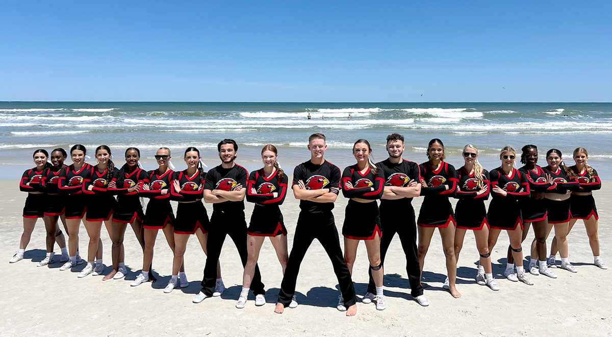 The cheer team poses at the beach. Courtesy photo.