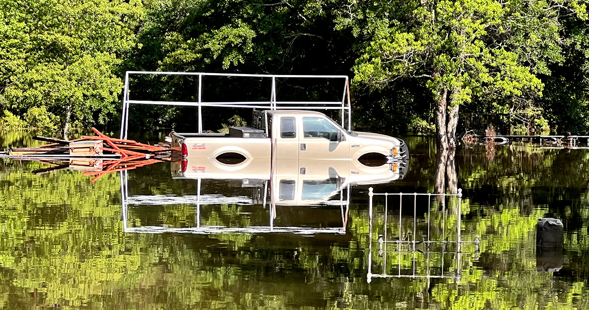 A truck caught in water after the storms in Kirbyville. UP photo by Taylor Justice.