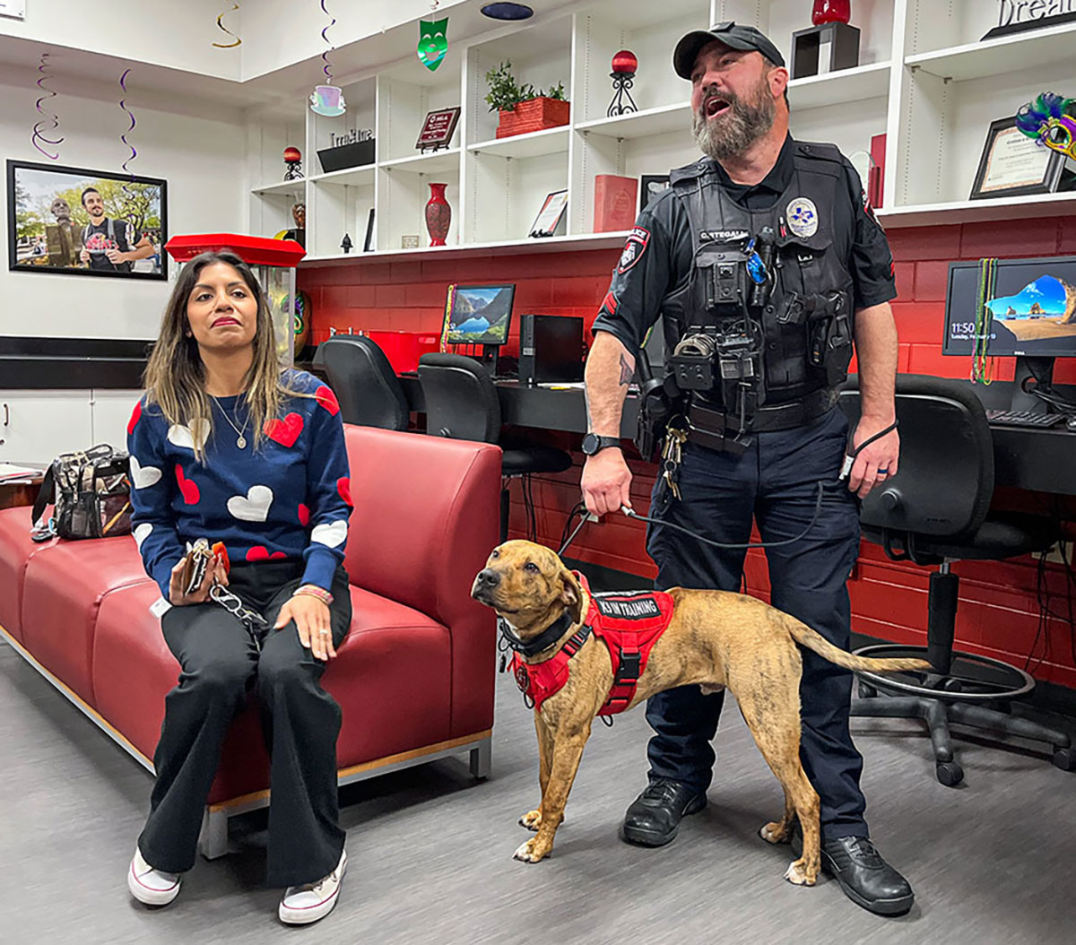 LUPD and staff with Derrick Boomer Lamar during the Mardi Paws pet food drive, Feb. 13, in the Galloway Business Building. UP photo by Brian Quijada.