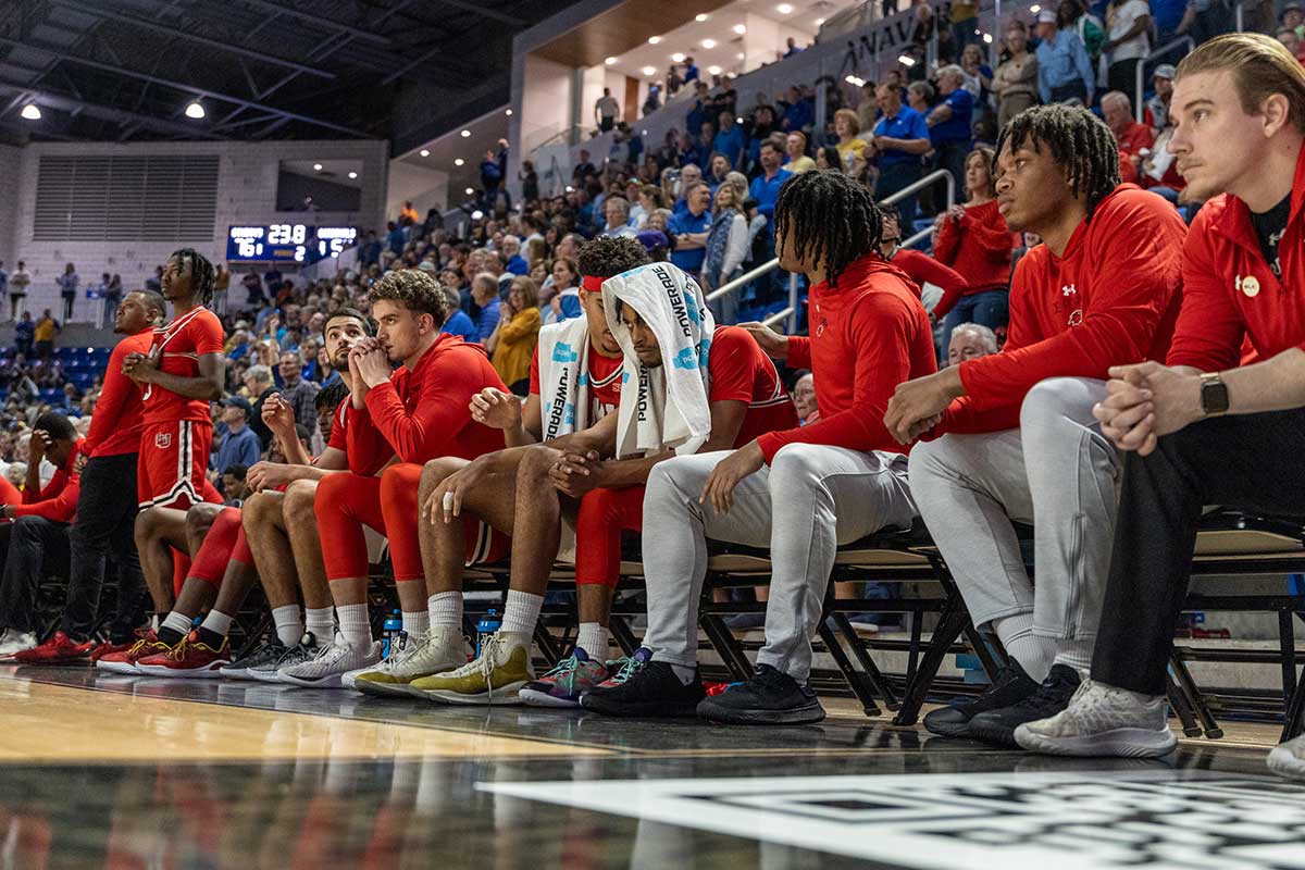 LU senior guard watches his team finish the game from the bench, during the Southland Conference tournament semifinal, in The Legacy Center, Lake Charles, La. March 12. UP photo by Brian Quijada.