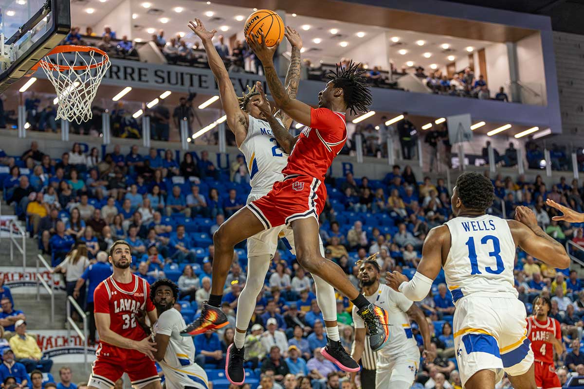 Cardinal forward Terry Anderson goes up for a basket against McNeese during the Southland Conference tournament semifinal, in The Legacy Center, Lake Charles, La. March 12. UP photo by Brian Quijada.