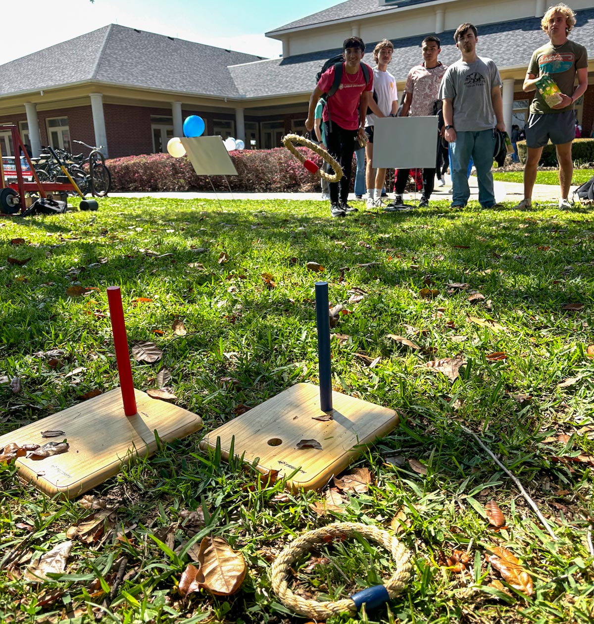 Students play ring toss during the Lamar University 100 Year Celebration, Mar. 5, in the Dining Hall Lawn. UP photo by Meredith Winkler.
