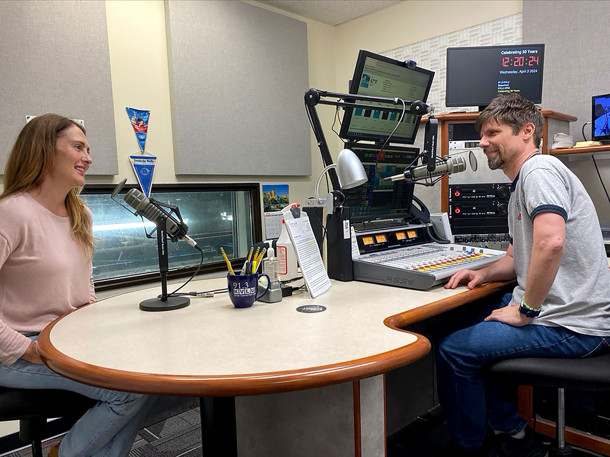 Shannon Harris, left, and Jason Miller in 91.3 KVLU’s master control studio. The radio station will celebrate 50 years on the air, 2-4 p.m., April 30 in the Setzer Student Center. UP photo by Maddie Sims.