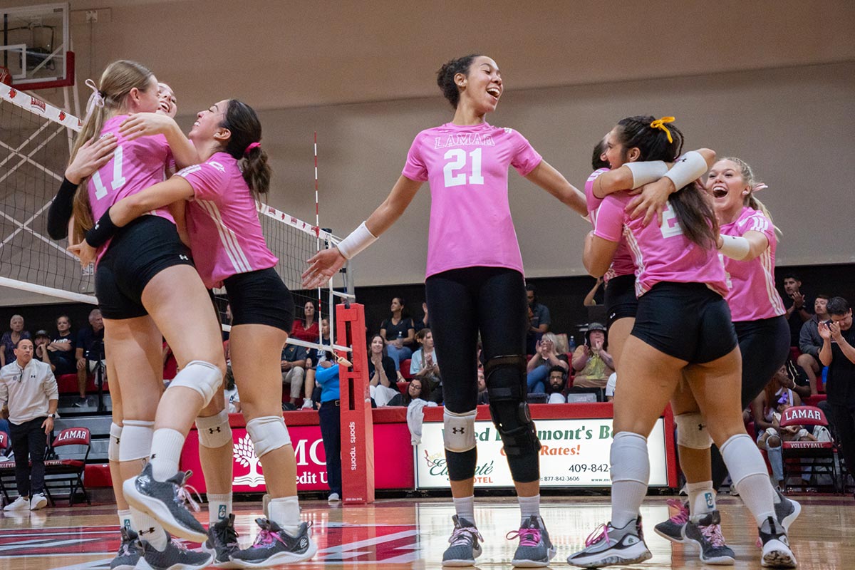 The Lamar Volleyball team celebrates after a play against Texas A&M Commerce, Oct. 3, at the McDonald Gym. UP photo by Carlos Viloria