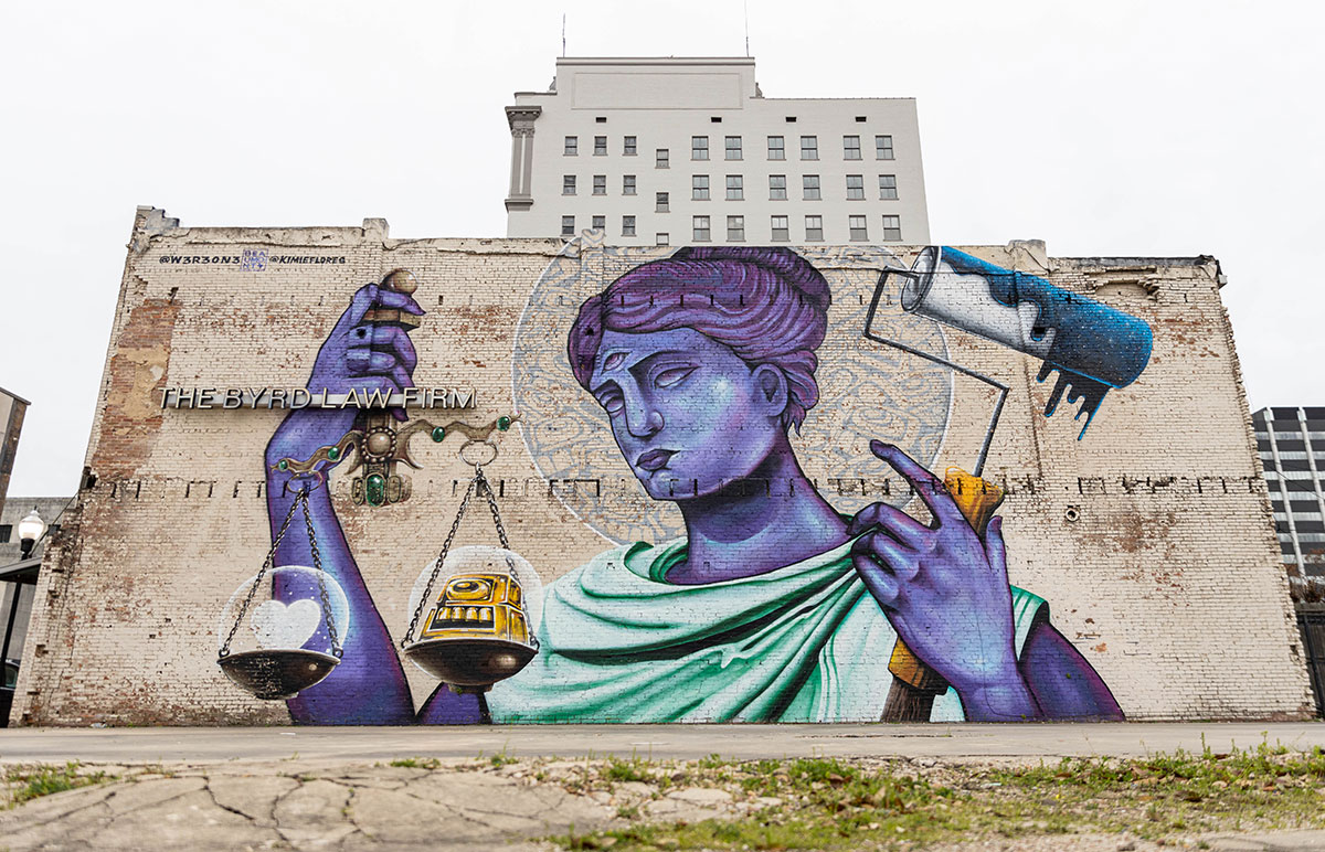 “Scales of Justice” by Kimmie Flores and W3r3on3, outside of The Byrd Law Firm building in Downtown Beaumont. UP photo by Brian Quijada.