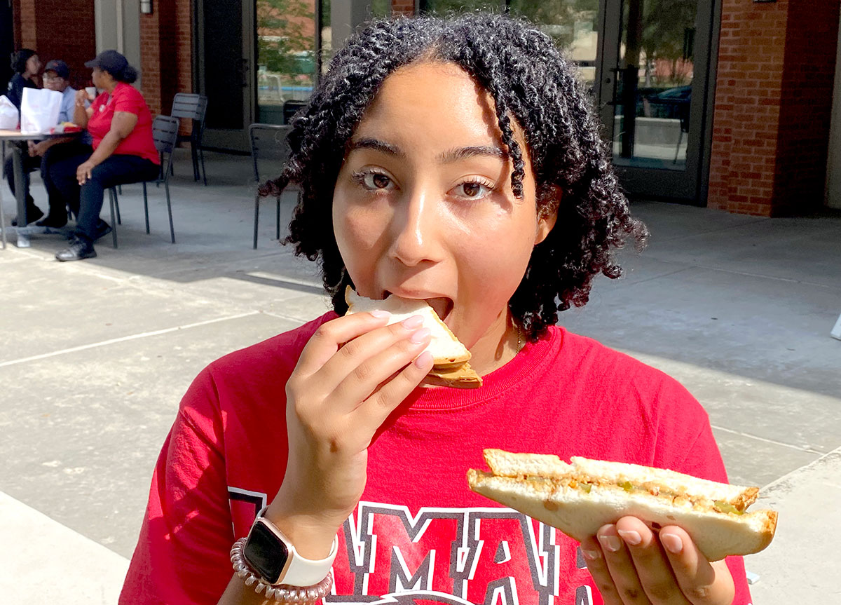 Winnie freshman Zoe Hagar having a sandwich. UP photo by Kami Greene.