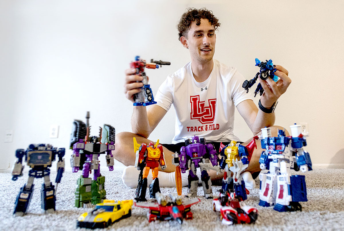 Esbjerg, Demark senior Patrick Wolf with his Transformers collection. Up photo by Brian Quijada.