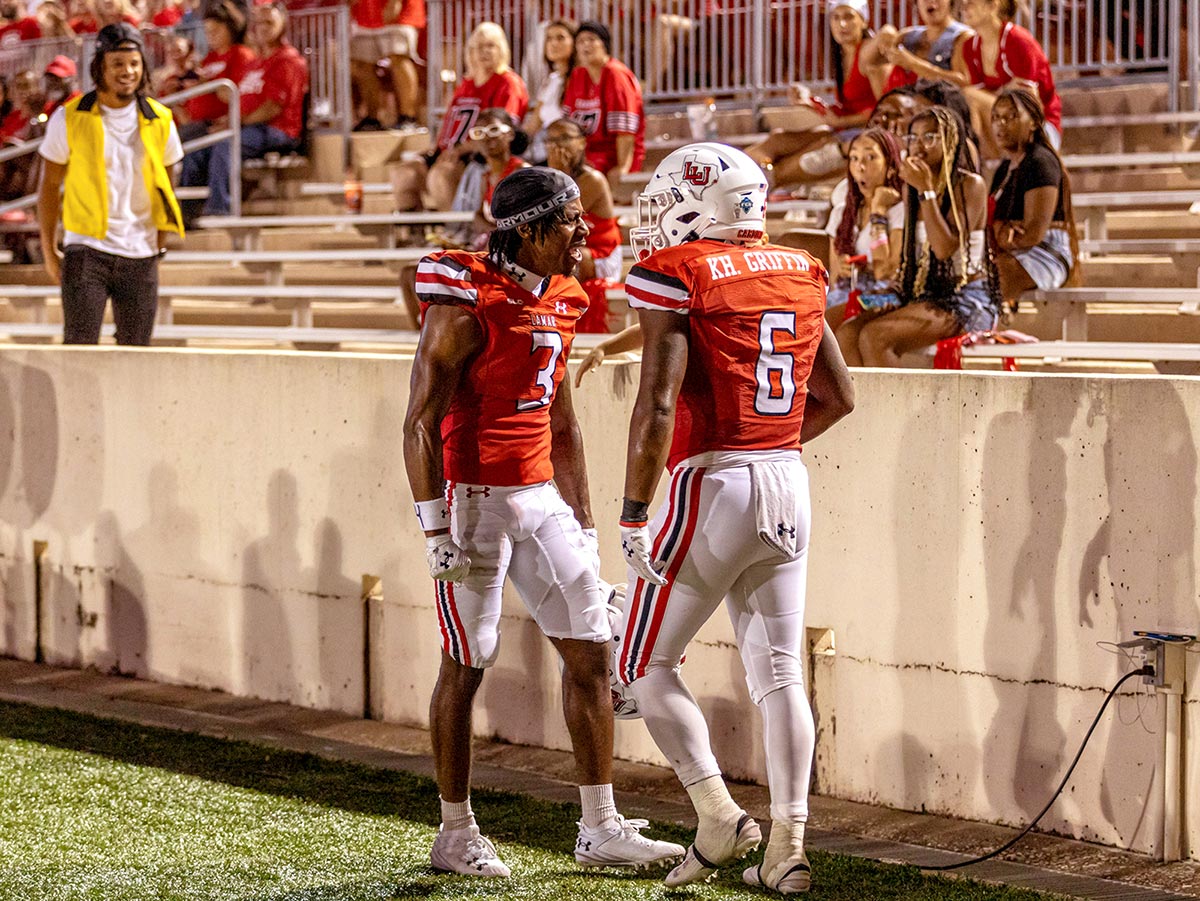 LU’s Ramond Stevens and Khalan Griffin celebrate the long-yardage play against MVSU, Sept. 7, at Provost Umphrey Stadium. UP photo by Brian Quijada.